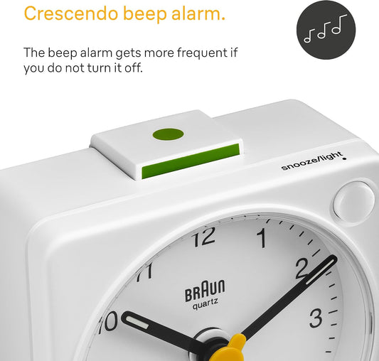 Braun Classic Travel Analogue Alarm Clock with Snooze and Light, Compact Size, Quiet Quartz Movement, Crescendo Beep Alarm in White, Model BC02XW.