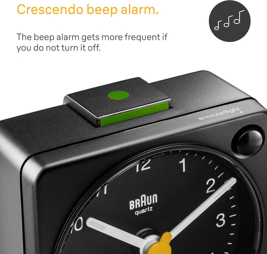 Braun Classic Travel Analogue Alarm Clock with Snooze and Light, Compact Size, Quiet Quartz Movement, Crescendo Beep Alarm in Black, Model BC02XB.