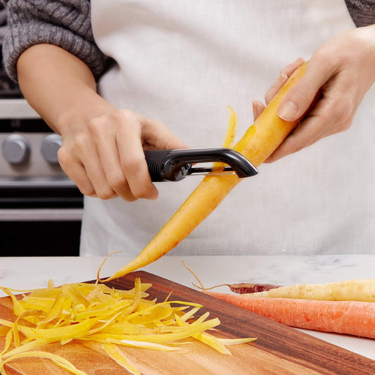 OXO Good Grips Swivel Vegetable Peeler with Soft Comfortable Handle - Black | Soft Non-Slip Grip on Handle, Built-in Potato Eye Remover, Rust Proof, Peels Vegetables and Fruits with Ease