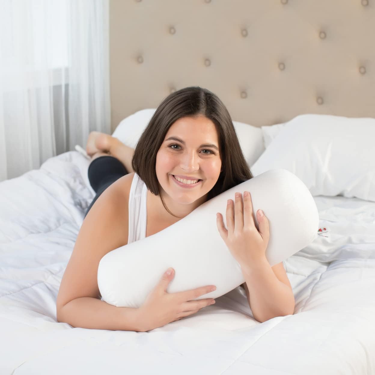 Core Jackson Roll Bolster Pillow for Neck, Back, Knee & Leg Support, WH | Versatile fiber-filled bolster supports the neck, back, knees and legs for comfortable resting, travel and sleep.