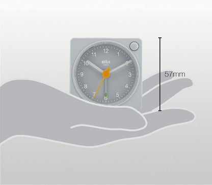 Braun Classic Travel Analogue Alarm Clock with Snooze and Light, Compact Size, Quiet Quartz Movement, Crescendo Beep Alarm in Black and White, Model BC02XBW.