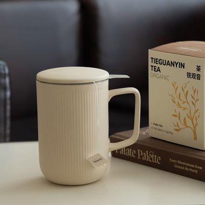 WENSHUO Tea Infuser Mug with Lid, Ceramic Cup for Loose Leaf, 20 oz, Crème | 20 oz ceramic tea infuser mug with lid and fine-mesh stainless steel basket for steeping loose leaf, floral and herbal teas.