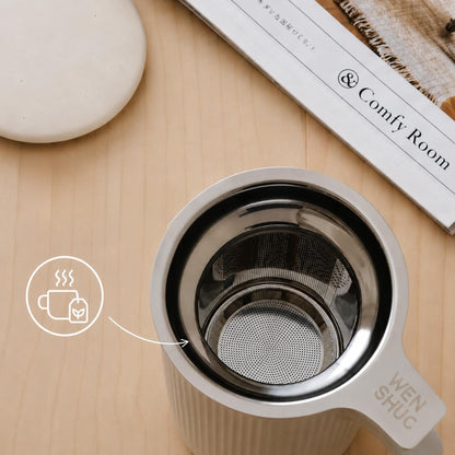 WENSHUO Tea Infuser Mug with Lid, Ceramic Cup for Loose Leaf, 20 oz, Crème | 20 oz ceramic tea infuser mug with lid and fine-mesh stainless steel basket for steeping loose leaf, floral and herbal teas.