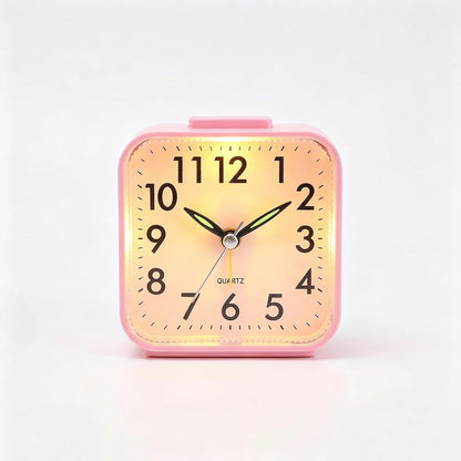 Small Analog Alarm Clock Battery Operated with Warm Glow Nightlight, Silent Non-Ticking Quartz Desk Clock, Easy-to-Read Dial, Battery Powered Travel Table Clock for Bedroom, Students, Office（Pink)