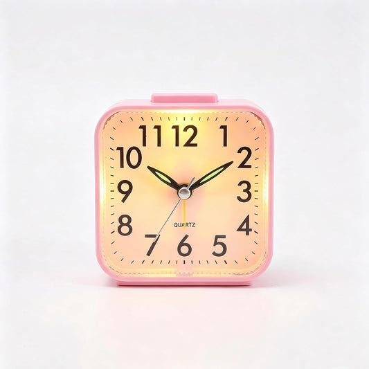 Small Analog Alarm Clock Battery Operated with Warm Glow Nightlight, Silent Non-Ticking Quartz Desk Clock, Easy-to-Read Dial, Battery Powered Travel Table Clock for Bedroom, Students, Office（Pink)