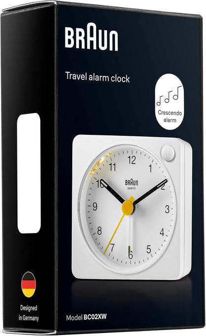 Braun Classic Travel Analogue Alarm Clock with Snooze and Light, Compact Size, Quiet Quartz Movement, Crescendo Beep Alarm in White, Model BC02XW.