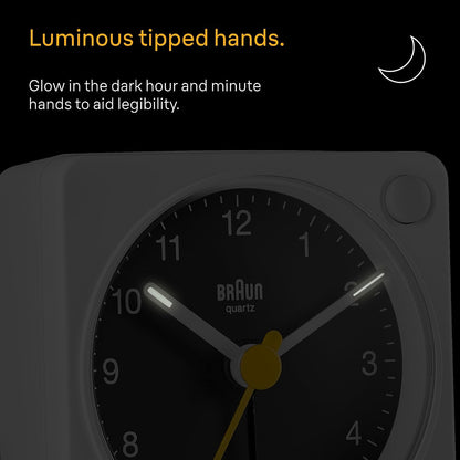 Braun Classic Travel Analogue Alarm Clock with Snooze and Light, Compact Size, Quiet Quartz Movement, Crescendo Beep Alarm in Black and White, Model BC02XBW.