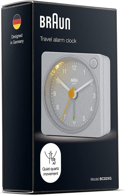 Braun Classic Travel Analogue Alarm Clock with Snooze and Light, Compact Size, Quiet Quartz Movement, Crescendo Beep Alarm in Black and White, Model BC02XBW.