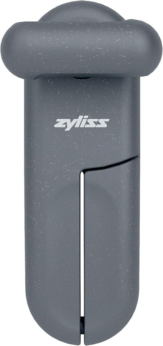 Zyliss MagiCan Manual Can Opener with Lid Release - Heavy Duty Can Opener Kitchen Gadgets - Home Manual Tin Open - Easy to Use Hand Held - Effortlessly Open Cans - Compact Design - Red