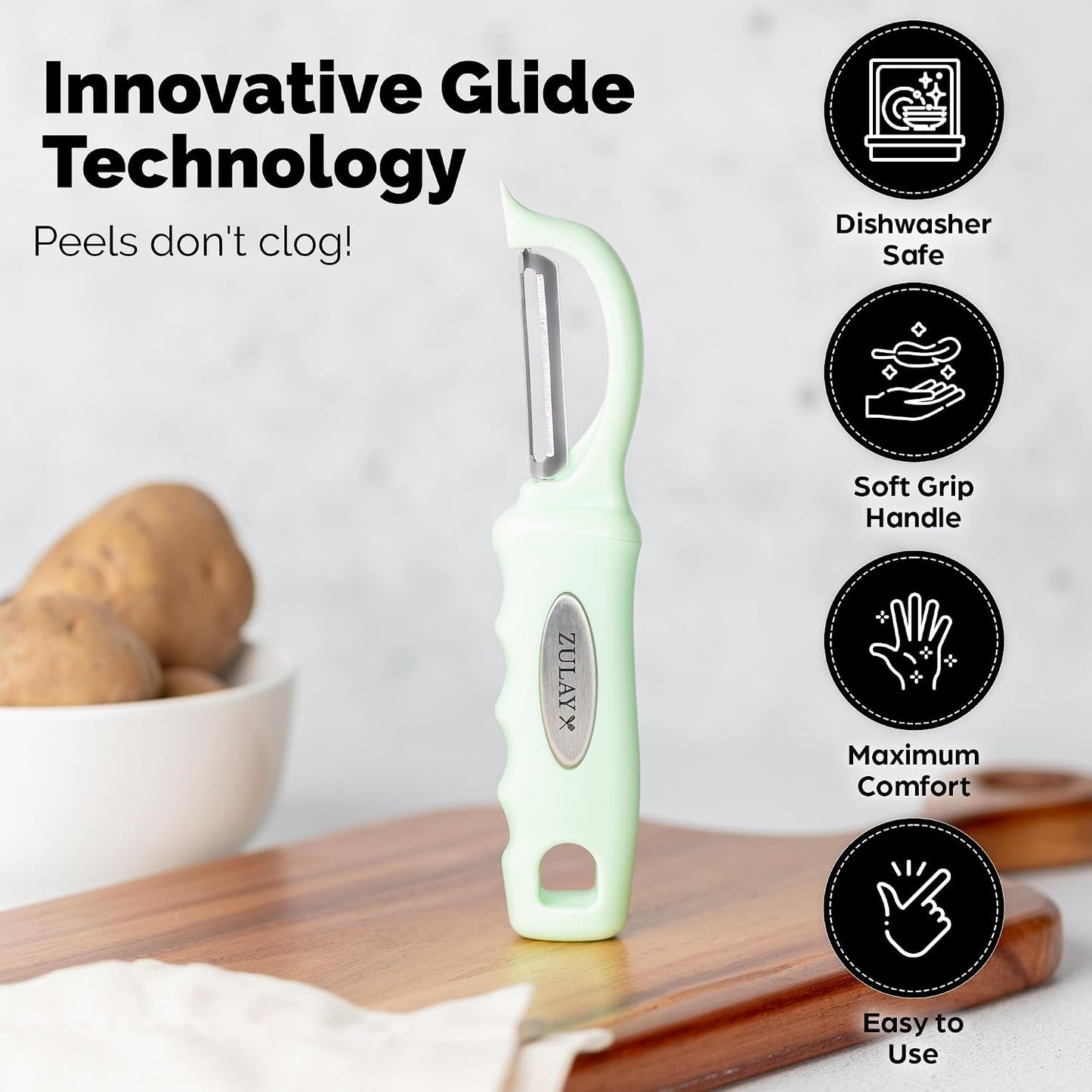 Zulay Kitchen Premium Vegetable Peeler for Kitchen - Swivel Peeler with Razor Sharp Stainless Steel Blades & Strong Ergonomic Handle - Dishwasher Safe, Easy To Use with Blemish Remover - Black
