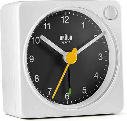 Braun Classic Travel Analogue Alarm Clock with Snooze and Light, Compact Size, Quiet Quartz Movement, Crescendo Beep Alarm in Black and White, Model BC02XBW.