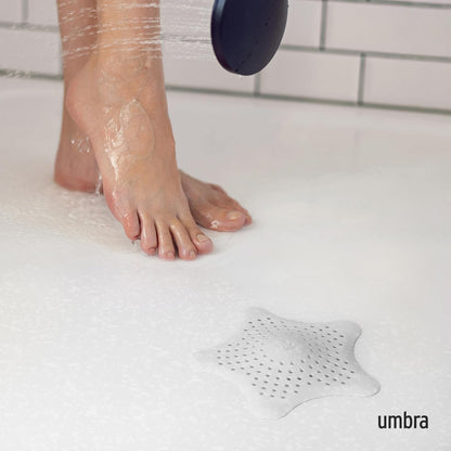 Umbra Starfish Hair Catcher, Suction Cup Drain Cover, 6-Inch, White | Silicone material, flexible and durable, water resistant seal, easy to clean, rust proof, fits standard tubs