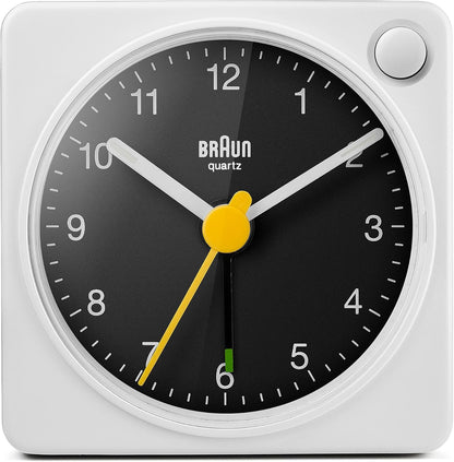 Braun Classic Travel Analogue Alarm Clock with Snooze and Light, Compact Size, Quiet Quartz Movement, Crescendo Beep Alarm in Black and White, Model BC02XBW.