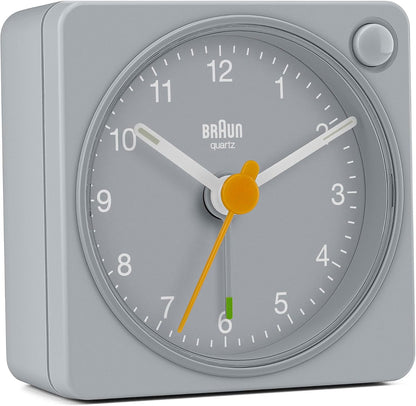 Braun Classic Travel Analogue Alarm Clock with Snooze and Light, Compact Size, Quiet Quartz Movement, Crescendo Beep Alarm in Black and White, Model BC02XBW.