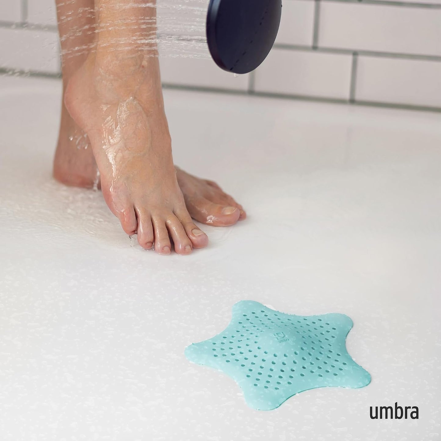 Umbra Starfish Hair Catcher, Suction Cup Drain Cover, 6-Inch, White | Silicone material, flexible and durable, water resistant seal, easy to clean, rust proof, fits standard tubs