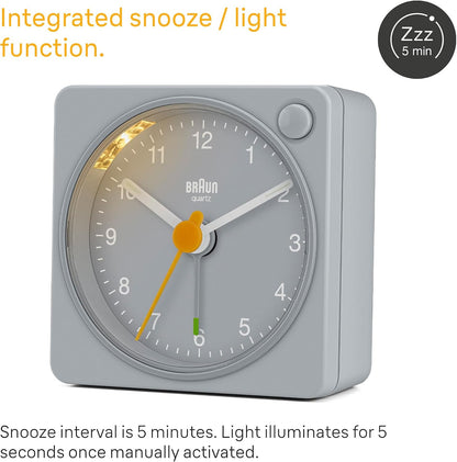 Braun Classic Travel Analogue Alarm Clock with Snooze and Light, Compact Size, Quiet Quartz Movement, Crescendo Beep Alarm in Black and White, Model BC02XBW.