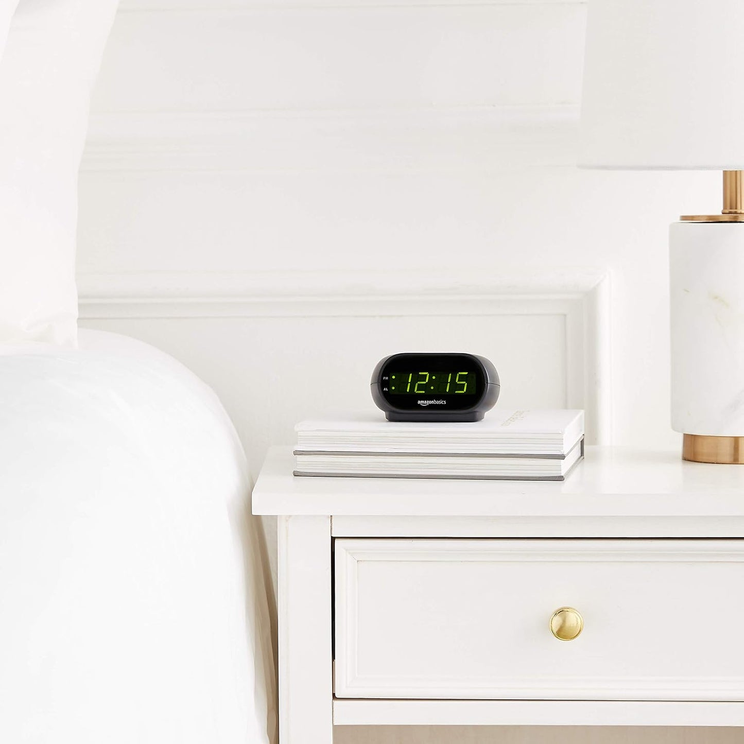 Amazon Basics Small Digital Oval Alarm Clock with LED Display, Nightlight, Snooze Function & Battery Backup, Black, 4.5 x 3.5 x 2.4 Inches
