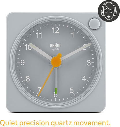 Braun Classic Travel Analogue Alarm Clock with Snooze and Light, Compact Size, Quiet Quartz Movement, Crescendo Beep Alarm in Black and White, Model BC02XBW.