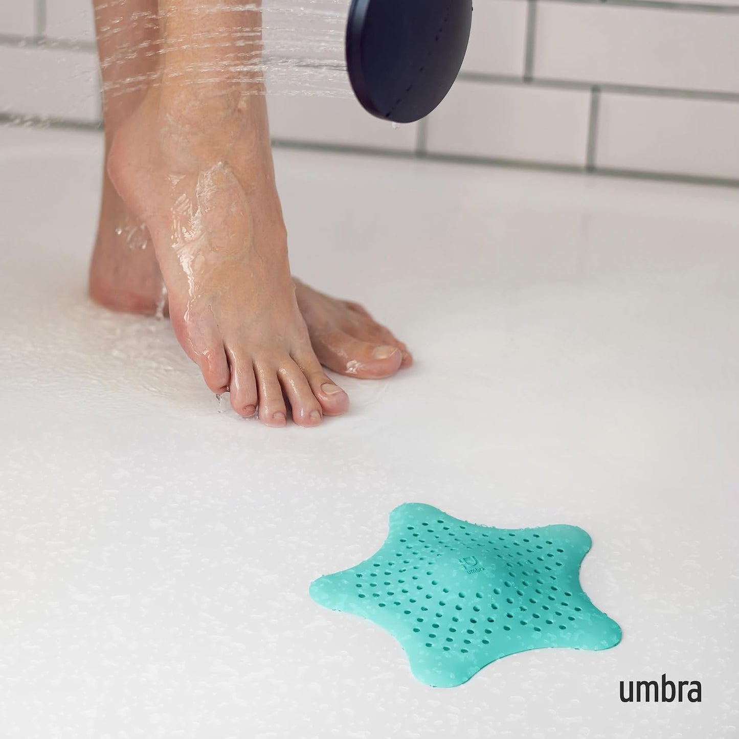 Umbra Starfish Hair Catcher, Suction Cup Drain Cover, 6-Inch, White | Silicone material, flexible and durable, water resistant seal, easy to clean, rust proof, fits standard tubs