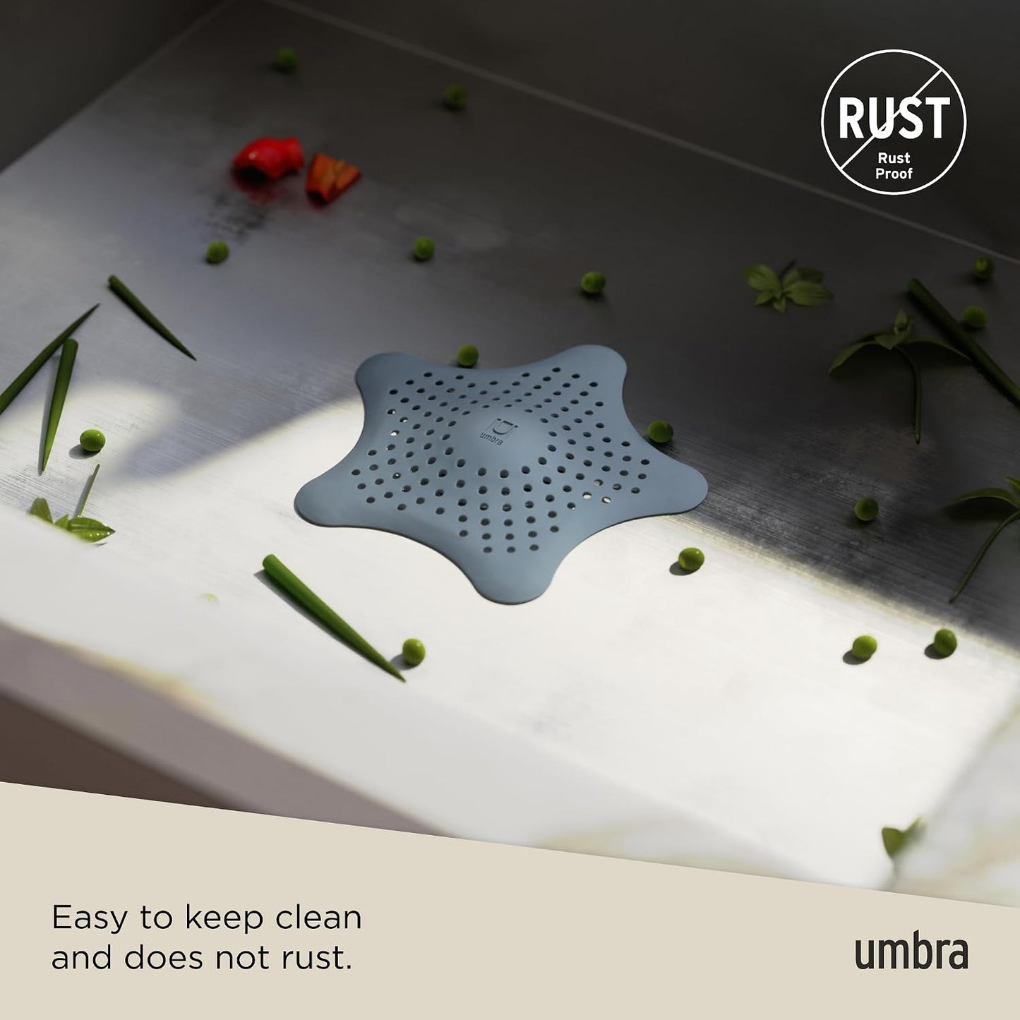 Umbra Starfish Hair Catcher, Suction Cup Drain Cover, 6-Inch, White | Silicone material, flexible and durable, water resistant seal, easy to clean, rust proof, fits standard tubs