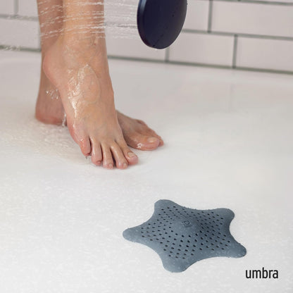 Umbra Starfish Hair Catcher, Suction Cup Drain Cover, 6-Inch, White | Silicone material, flexible and durable, water resistant seal, easy to clean, rust proof, fits standard tubs