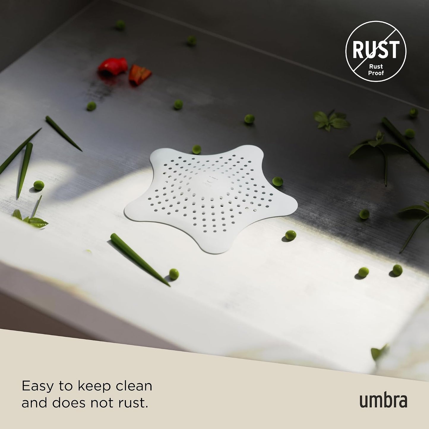 Umbra Starfish Hair Catcher, Suction Cup Drain Cover, 6-Inch, White | Silicone material, flexible and durable, water resistant seal, easy to clean, rust proof, fits standard tubs