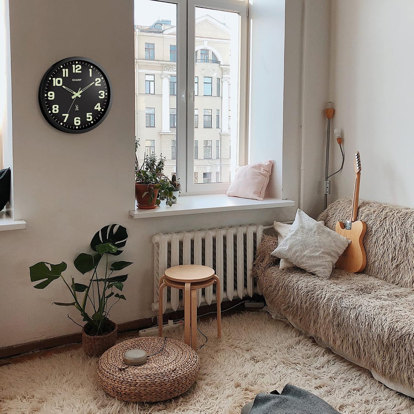 Sharp 12-Inch Atomic Wall Clock, Battery Operated, White with Black Frame | Self-setting atomic time; Easy-read analog face; Automatic time adjustment; Simple setup; Versatile home or office style