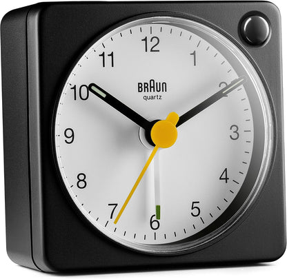 Braun Classic Travel Analogue Alarm Clock with Snooze and Light, Compact Size, Quiet Quartz Movement, Crescendo Beep Alarm in Black and White, Model BC02XBW.