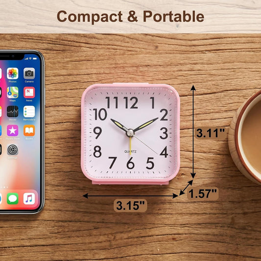 Small Analog Alarm Clock Battery Operated with Warm Glow Nightlight, Silent Non-Ticking Quartz Desk Clock, Easy-to-Read Dial, Battery Powered Travel Table Clock for Bedroom, Students, Office（Pink)