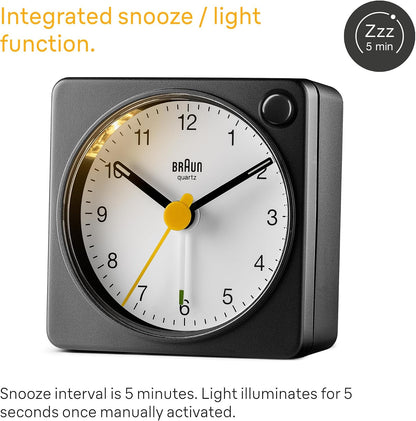 Braun Classic Travel Analogue Alarm Clock with Snooze and Light, Compact Size, Quiet Quartz Movement, Crescendo Beep Alarm in Black and White, Model BC02XBW.
