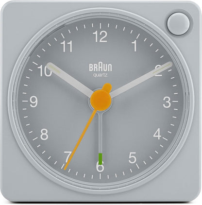 Braun Classic Travel Analogue Alarm Clock with Snooze and Light, Compact Size, Quiet Quartz Movement, Crescendo Beep Alarm in Black and White, Model BC02XBW.