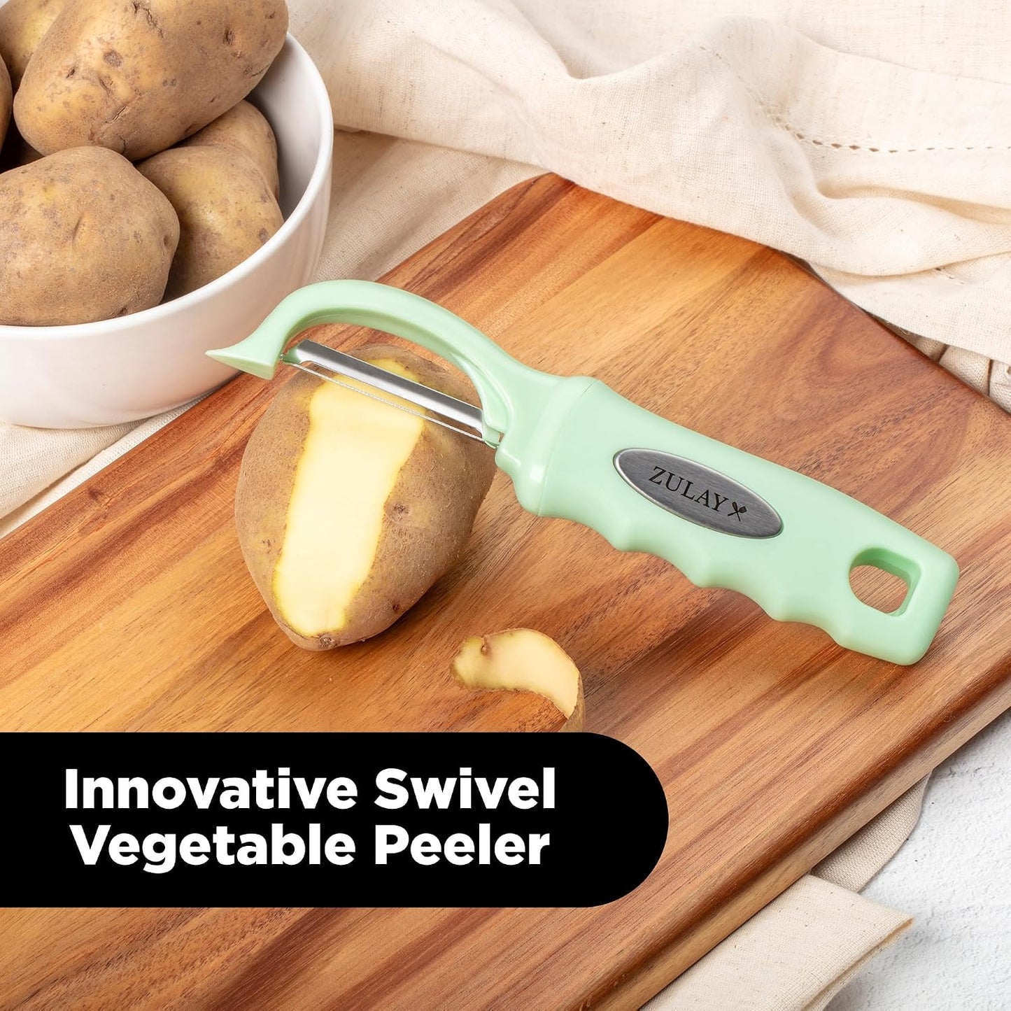 Zulay Kitchen Premium Vegetable Peeler for Kitchen - Swivel Peeler with Razor Sharp Stainless Steel Blades & Strong Ergonomic Handle - Dishwasher Safe, Easy To Use with Blemish Remover - Black