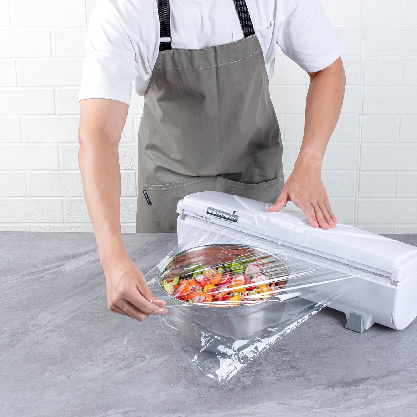 Restaurantware-Chef 101 Food Wrap Dispenser with Cutter, 1 Refillable Cling Wrap Dispenser - Fits 12” to 18” x 1000’ Rolls, Press Down and Cut, White Plastic Aluminum Foil, Sharp Blade