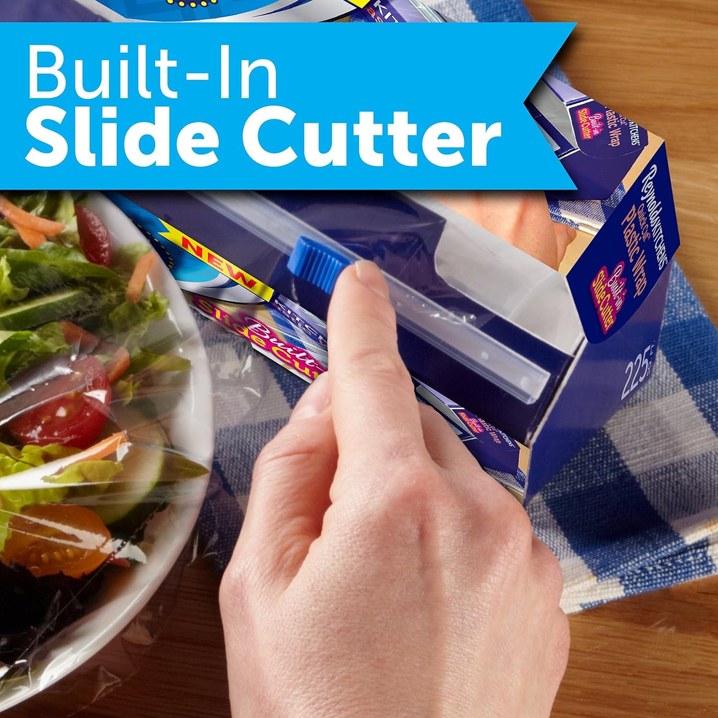 Reynolds Kitchens Clear Plastic Wrap, Built-In Slide Cutter, 225sq ft | Plastic Cling Wrap for Food Storage, Seals in Freshness, Clean Cut Every Time, Ideal For Leftovers, BPA-Free, 12 in x 225 ft