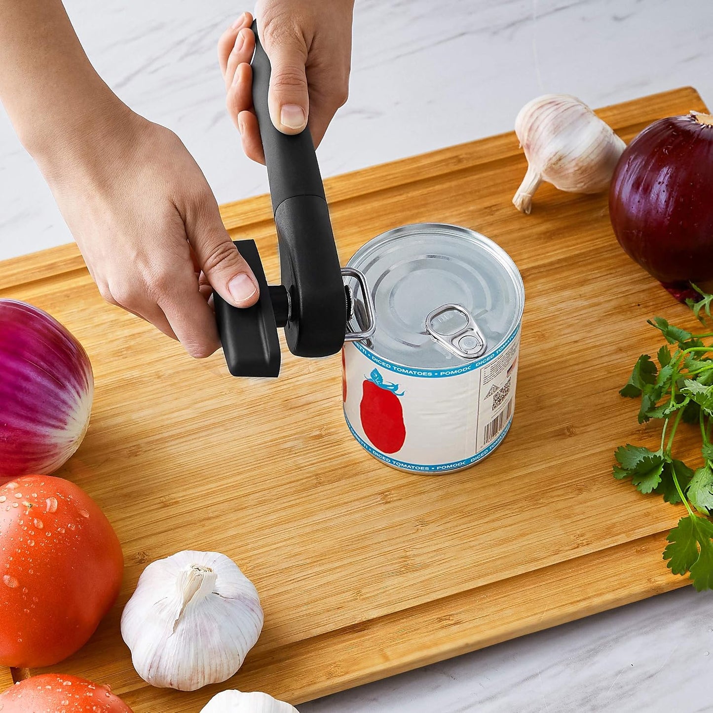 Amazon Basics Manual Can Opener, Easy to Use, Hand Held with Soft Grip Single Handle, Clean Cutting, Large, Black